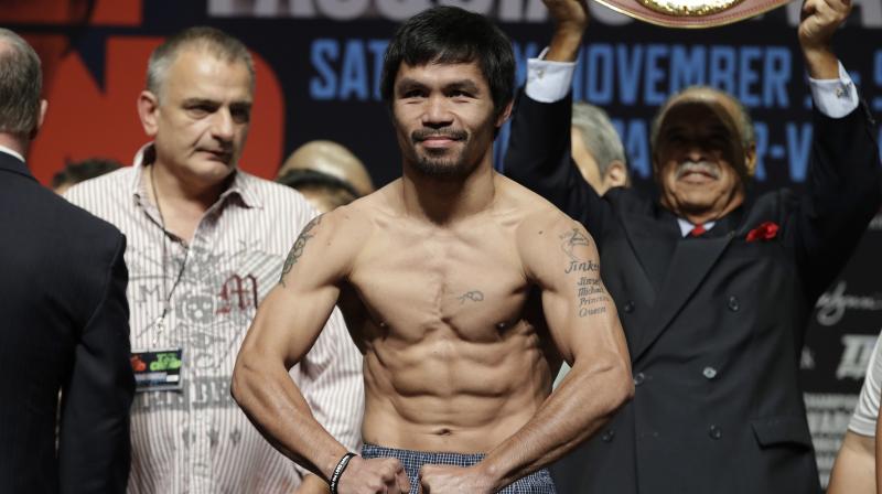 Pacquiao won the WBO title for the first time in 2010 when he beat Miguel Cotto. (Photo: AP)