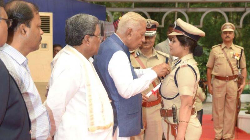 DIG D. Roopa, who exposed corruption and irregularities in the prisons department recently, was conferred with Presidents Police Medal for Meritorious Service by Governor Vajubhai R Vala at the Investiture Ceremony held at Raj Bhavan on Saturday in the presence of the Karnataka Chief Minister Siddaramaiah and Home Minister Ramalinga Reddy.