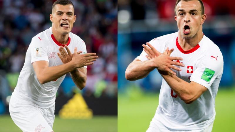 Switzerlands scorers on Friday, Granit Xhaka and Xherdan Shaqiri, celebrated their goals by making a \double eagle\ gesture with their hands to represent the Albanian flag. (Photo: AP)
