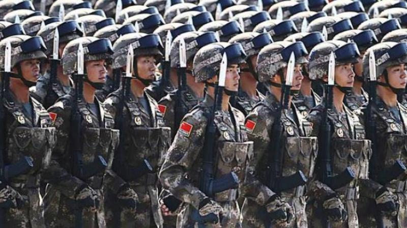 The number of troops in the PLA Navy, PLA Strategic Support Force and the PLA Rocket Force will be increased, while the PLA Air Forces active service personnel will remain the same. (Photo: AFP/File)