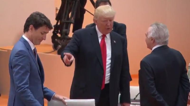 After being straight-faced for more than 30 seconds into the video, Trudeau finally managed a smile when Trump noticed him and beckoned him to join the conversation. (Photo: videograb)