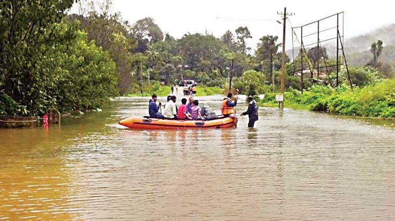 Bagamandala in Kodagu district was flooded on Wednesday forcing people to rely on boats.