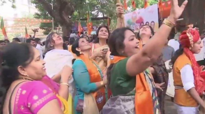 Workers celebrate partys victory as BJP retains Gujarat for six times in a row