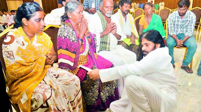 Jana Sena chief Pawan Kalyan visits the family members of deceased at Anantapur who were killed in road mishap in Kurnool district. 	 DC