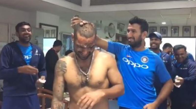 Not only Dhawan, but Team India physiologist Patrick Farhart was also a victim of the cake facial. (Photo: Screengrab/BCCI)