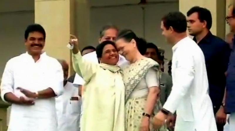 Rahul Gandhi and Sonia Gandhi meet BSP chief Mayawati at Vidhana Soudha. (Photo: Twitter/ANI)