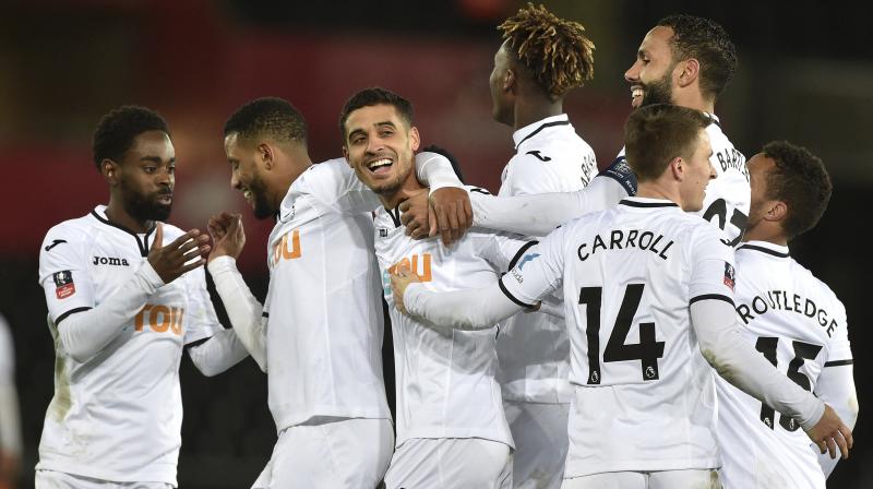 Carlos Carvalhal has masterminded wins for Swansea over Liverpool and Arsenal in recent weeks to lift the Welsh club out of the Premier Leagues relegation zone. (Photo: AP)