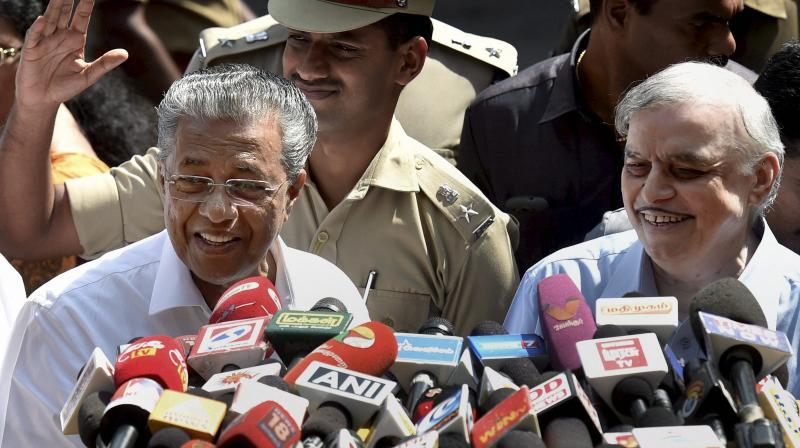 Kerala Governor P. Sathasivam with Chief Minister Pinarayi Vijayan (Photo: PTI)