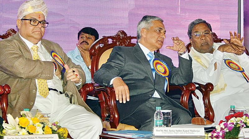 CM Siddaramaiah with Chief Justice of India, T.S. Thakur and Chief Justice of Karnataka Subhro Kamal Mukherjee at the 18th Biennial State Level  Judicial Conference at Jnana Jyothi Auditorium, in Bengaluru on Monday.