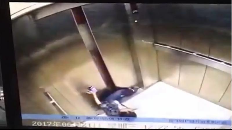 A woman in China has allegedly had her leg severed by a faulty lift after getting it trapped between the closing doors. (Photo: Youtube Screengrab)