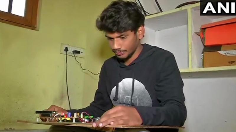 Sai Teja, 22 year-old-man from Hyderabad who did not pursue his education after 10th class invented a new smart system for vehicles to avoid road accidents (Image:ANI)