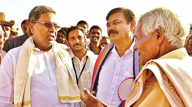 Chief Minister Siddaramaiah during a visit to drought-hit villages in Ramanagara district on Wednesday