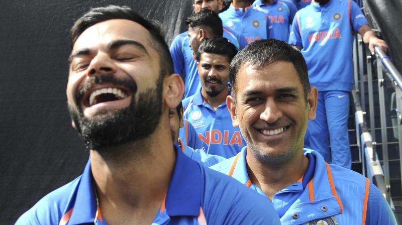 The leadership transition from MS Dhoni to Virat Kohli has been a smooth ride as the two continue to share a heartwarming relation with each other. (Photo: AP)