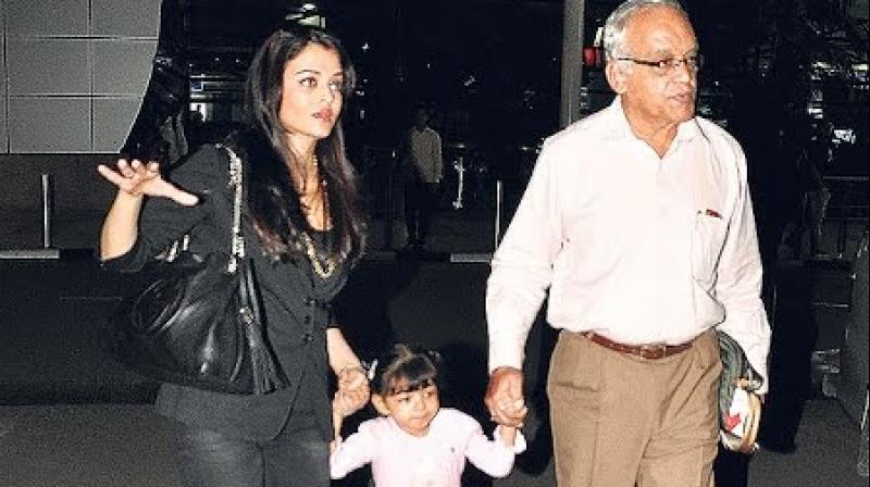 Aishwarya Rai Bachchan with her father Krishnaraj Rai and daughter Aaradhya.