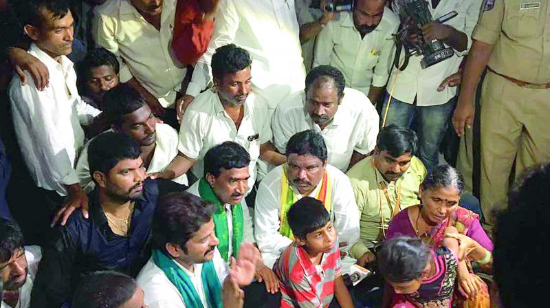 MLA A. Revanth Reddy consoles the family members of Nagamani in Siddipet on Wednesday.