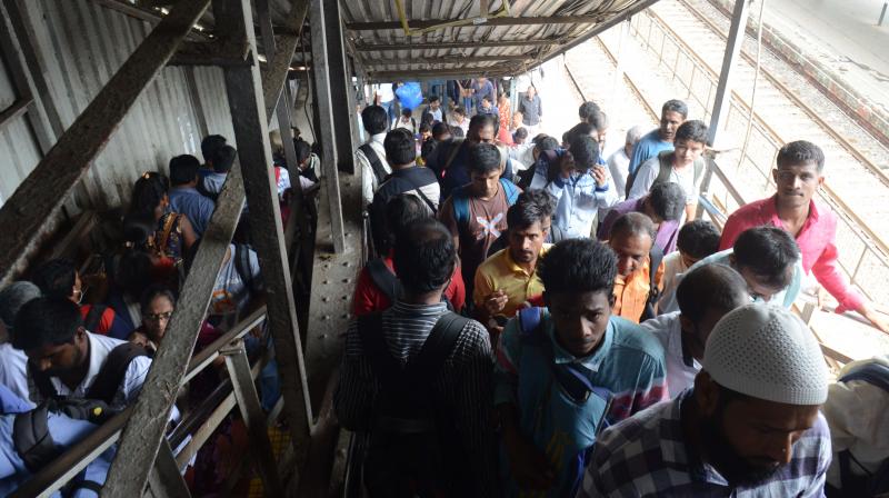 At least 22 people were killed and 39 injured in the rush-hour stampede on the narrow overbridge linking Elphinstone Road and Parel suburban stations during the heavy rain. (Photo Rajesh Jadhav)
