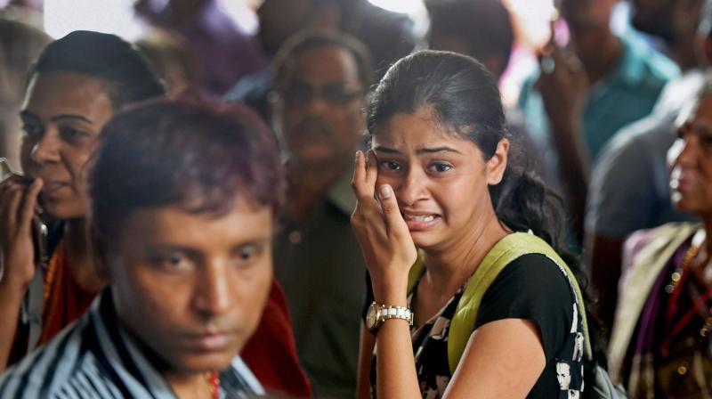 At least 22 people were killed in a stampede on foot overbridge at Elphinstone Road railway station in Mumbai. (Photo: PTI