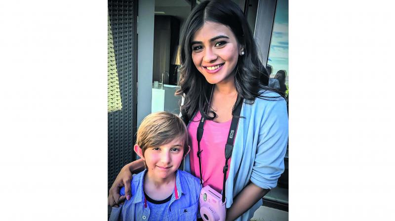 A photo of Bujji and Hebah Patel on the sets of Mister.