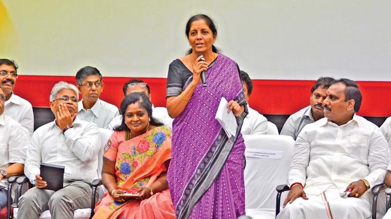 Union minister of state for commerce and industry, Nirmala Sitharaman, explains the provisions of Goods and Service Tax at an event organised by Tamil Nadu BJP unit on Sunday. (Photo: DC)