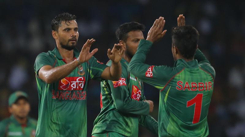 \I am feeling proud to have played with these boys and the support staff. Big thanks to my cricket board and my family,\ Mashrafe Mortaza said in choked voice. (Photo: AP)