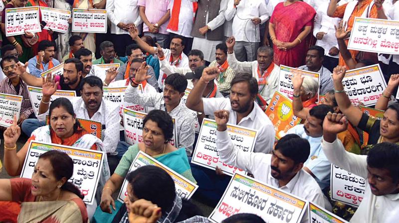 BJP leaders  protest against Chief Minister H.D. Kumaraswamy for his remark against their party in Bengaluru on Friday (Photo: KPN)