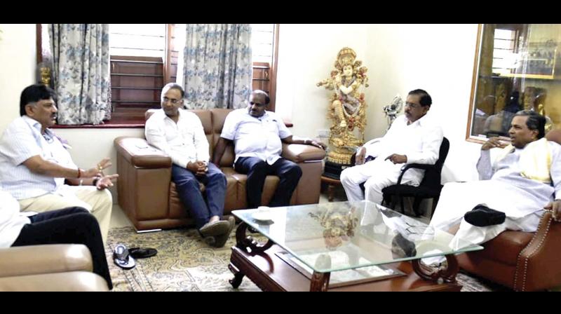 Former CM Siddaramaiah, DyCM G. Parameshwar, CM H.D. Kumaraswamy, KPCC chief Dinesh Gundurao and Minister D.K. Shivakumar at a meeting in Bengaluru on Friday 	(Photo:  KPN)