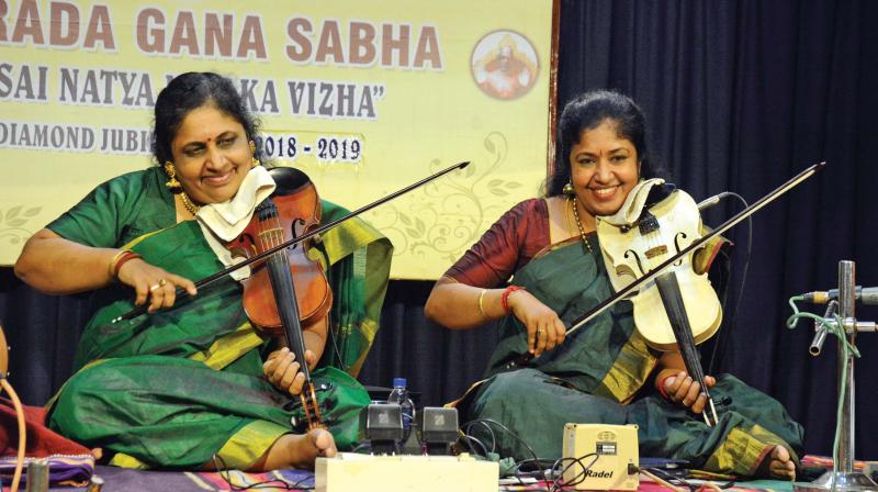 Violinists M. Lalitha and M. Nandini performing at Narada Gana Sabhas Isai Natya Nataka Vizha on Saturday.	DC
