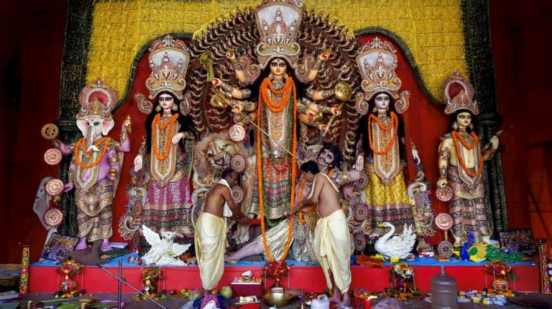 Here is a list of five podcasts that will be helpful to every devotee trying to have a memorable Durga Puja. (Photo: PTI)