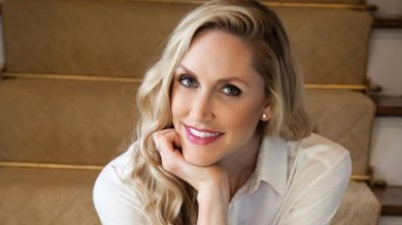 Lara Trump is the wife of Eric Trump, the second son of Donald Trump. (P