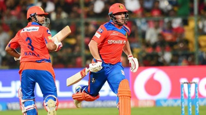 Gujrat Lions Aaron Finch and Suresh Raina runs between the wicket during the IPL 10 match against Royal Challengers Bangalore at Chinnaswamy Stadium in Bengaluru on Thursday.  (Photo: PTI)