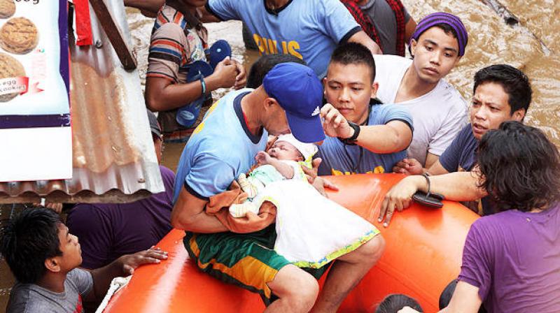 Nineteen deaths were reported near the town of Tubod on Friday on Mindanao, the archipelago nations second-largest island, where Tropical Storm Tembin unleashed flash floods and mudslides erased a remote village from the map, police said. (Photo: AFP)