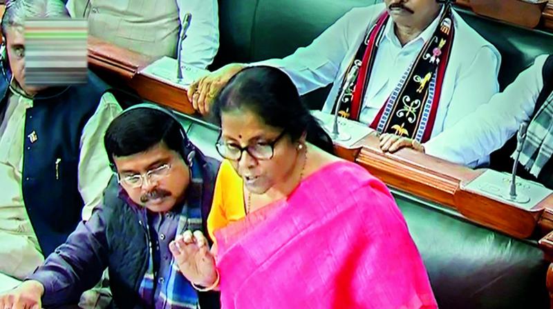 Union defence minister Nirmala Sitharaman speaks in the Lok Sabha during the Parliament Winter Session, in New Delhi on Monday.  (PTI)
