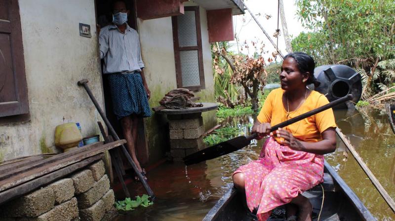 Houses at Valiyathuruthu settlement in Kainakary panchayath in Kuttanad remain inundated and the people are forced to stay in them.