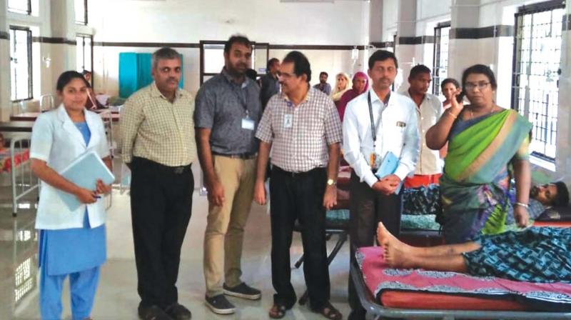 Health officials, led by DMO Dr V Jayashree, visit the lepto isolation ward at Kozhikode medical college hospital on Tuesday.