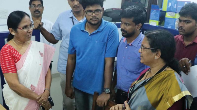 Health Minister K.K. Shylaja interacts with director of health services Dr Saritha R.L. at the control room in Thiruvananthapuram on Tuesday.