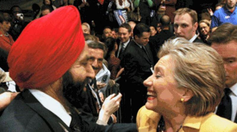 Indian-American hotelier Sant Singh Chatwal with Hillary Clinton. (Photo: PTI/File)