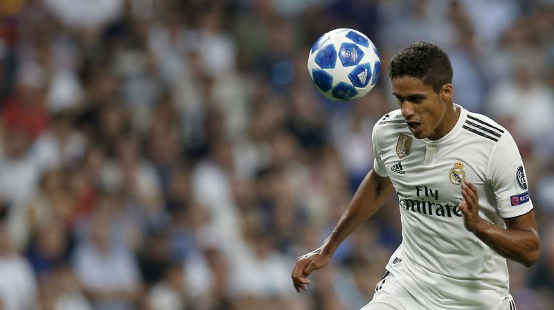 (Varane) has been diagnosed with a muscle injury to the adductor longus in his right leg,  said Madrid in a statement Tuesday. (Photo: AP)