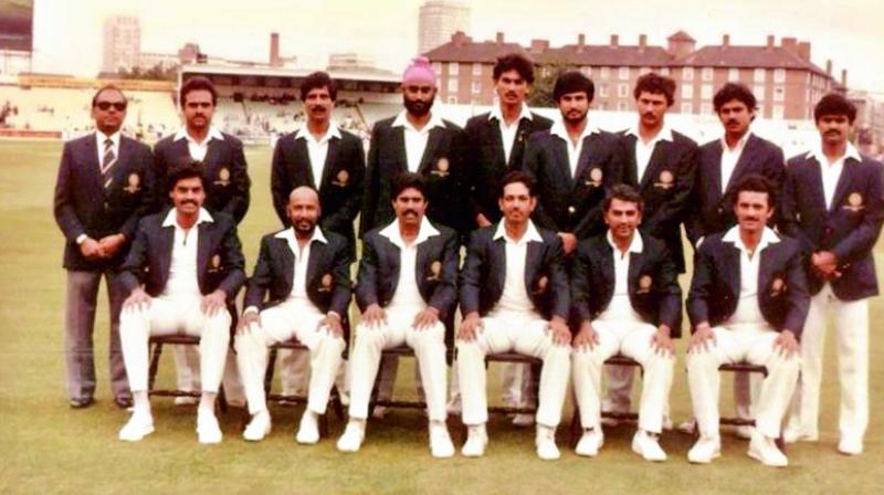 Players of the 1983 World Cup winning Indian cricket team led by Kapil Dev (sitting third from left) along with manager P. R. Man Singh (standing left) in this file photo.
