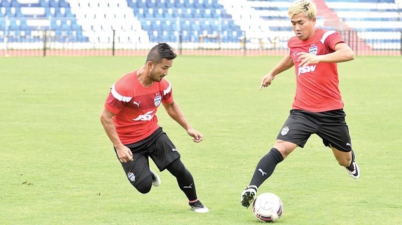 New Bengaluru FC signings Bidyananda Singh (right) and Robinson Singh at a training session on Monday. (Photo: DC)
