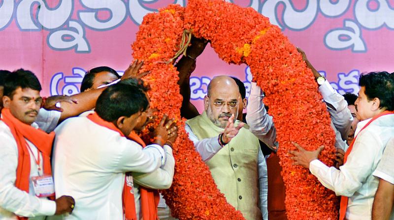 BJP leaders welcome Amit Shah at Exhibition Grounds in Hyderabad on Wednesday.  (Photo:S Surender Reddy)