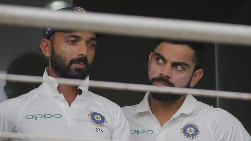 India captain Virat Kohli on Friday took a dig at critics questioning Ajinkya Rahanes exclusion in the first Test against South Africa, stating that those who wanted his deputys omission are now clamouring for his comeback.(Photo: AP)