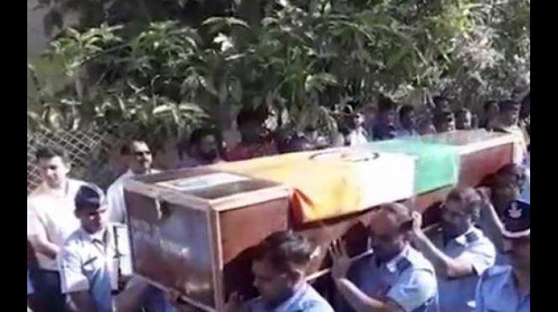 The funeral of pilot Ninad Mandavgane, who died in an IAF helicopter crash in Jammu and Kashmir two days back, was held with full military honours in Nashik on Friday. (Photo: Twitter/ @currenttrendng)