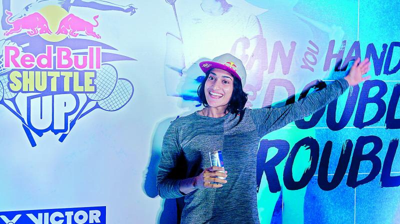 Shuttler Ashwini Ponnappa interacts with media at an event in Hyderabad on Wednesday to launch a womens doubles badminton tournament.