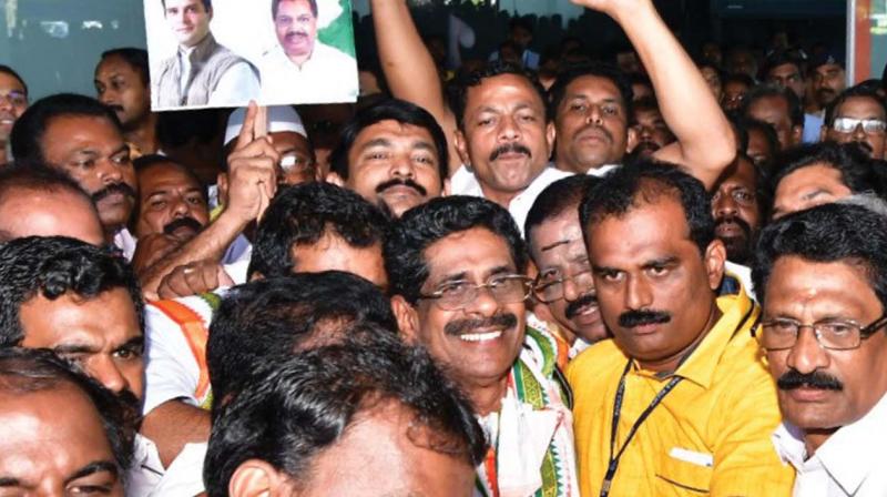 Workers and leaders receive newly-appointed KPCC president Mullappally Ramachandran at Trivandrum International Airport on Wednesday (Photo: A.V. MUZAFAR)