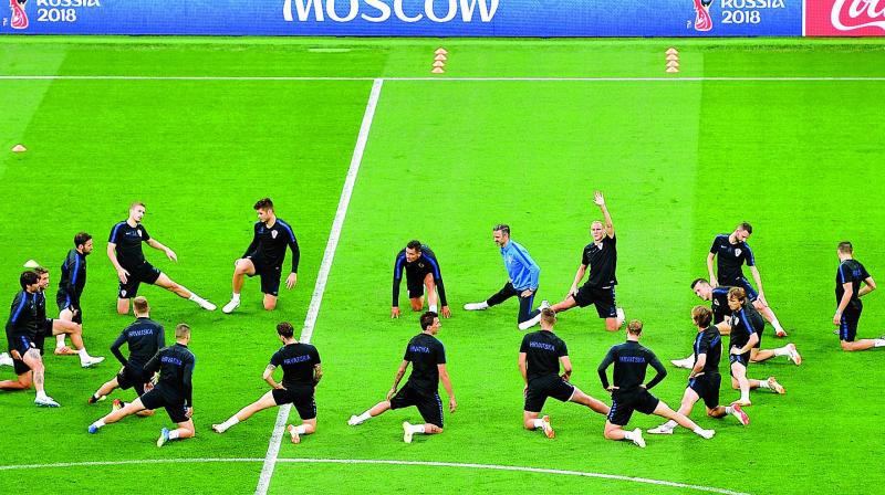 Croatian team warm-up before training sessions ahead of their World Cup final to be played at the Luzhniki Stadium in Moscow on Sunday.