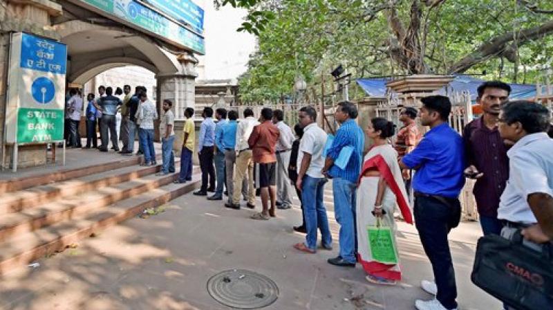 Many sections of the society including grocery shop owners, small traders, restaurant owners, are further feeling the heat as their dependence on cash is very high. (Photo: PTI)