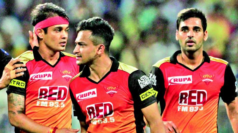 Sunrisers Hyderabad team-mates congratulate Siddarth Kaul (left) on dismissing Kolkata Knight Riders Sunil Narine during IPL Qualifier 2 in Kolkata on Friday.  (Photo:PTI)