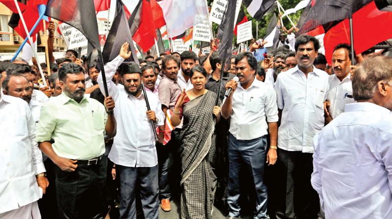 DMK MP Kanimozhi with other Opposition leaders stage a protest in Chennai on Friday. (Photo:DC)
