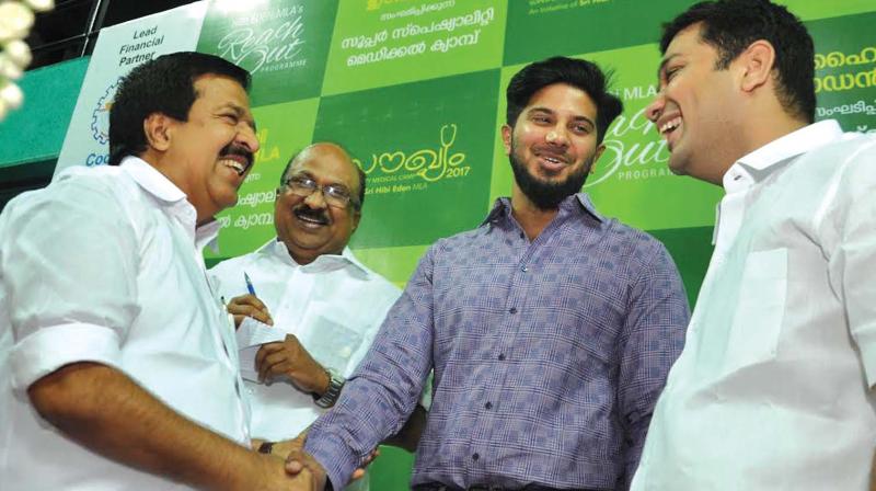 Opposition leader Ramesh Chennithala, Prof. K.V. Thomas, MP, actor Dulquer Salmaan and Hibi Eden, MLA, at the inauguration of the Soukhyam-2017 super specialty medical camp held at Rajeev Gandhi Indoor stadium organised as part of the MLAs reach out programme in Kochi on Sunday.  (Photo: SUNOJ NINAN MATHEW)