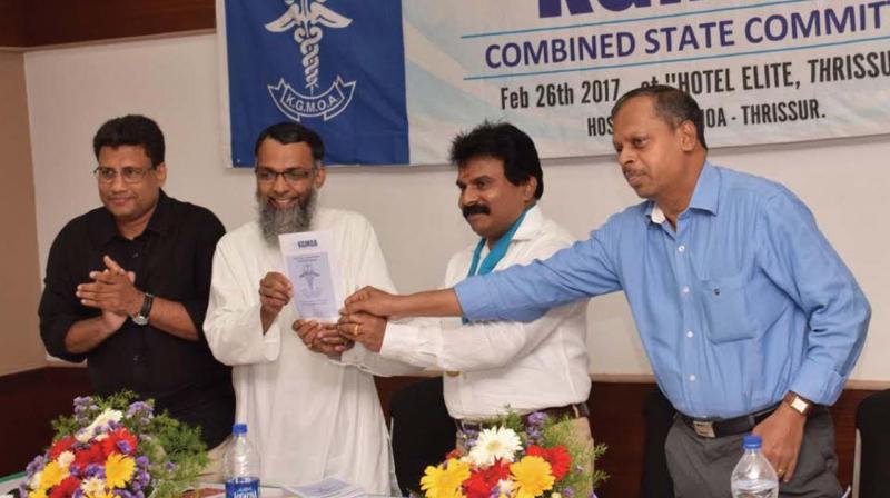 KGMOA members inaugurating the membership campaign at the state-level meeting held in Thrissur on Sunday. (Photo: DC)